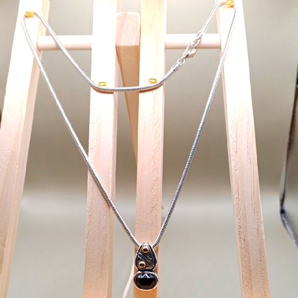 Elegant Silver Necklace with Gold Accents